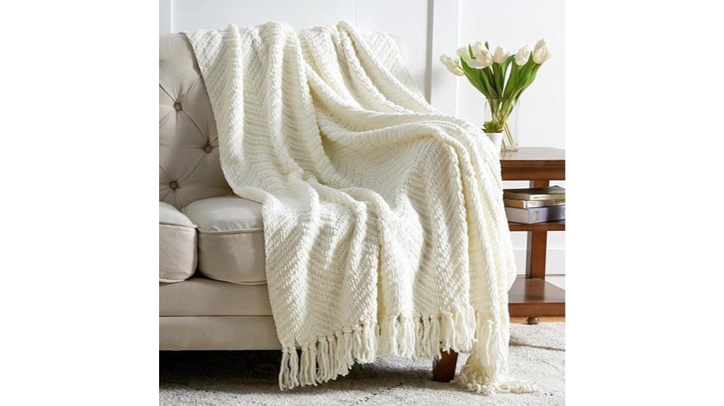 cream couch bed blanket